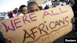 Migrants in Cape Town's Mannenberg community demonstrate against xenophobia. (UTERS/Mike Hutchings)