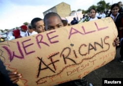 FILE - Migrants in Cape Town's Mannenberg community demonstrate against xenophobia. (UTERS/Mike Hutchings)