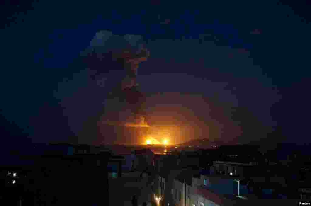 Smoke rises after an explosion at a chemical plant that produces paraxylene, or PX, used in making polyester fiber and plastics, in Zhangzhou, Fujian province, China.