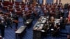 Para manajer sidang pemakzulan mantan presiden Donald Trump meninggalkan Senat usai menyerahkan pasal-pasal pemakzulan, di Capitol, Senin, 25 Januari 2021.