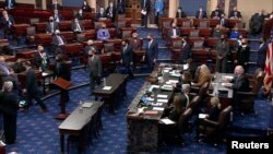 U.S. House impeachment managers leave the Senate after delivering the House article of impeachment against former President Donald Trump on accusations of inciting the January 6 attack on the Capitol