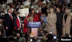 FILE - Melania Trump talks to the crowd as U.S. Republican presidential candidate Donald Trump introduces his family at a rally at the Myrtle Beach Convention Center in Myrtle Beach, South Carolina, Nov. 24, 2015.