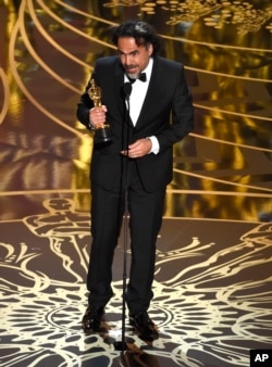 Alejandro G. Inarritu accepts the award for best director for “The Revenant” at the Oscars on Sunday, Feb. 28, 2016, at the Dolby Theatre in Los Angeles. (Photo by Chris Pizzello/Invision/AP)