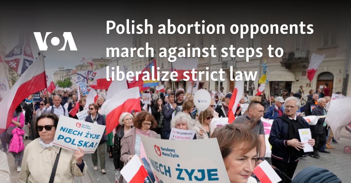 Polish abortion opponents march against steps to liberalize strict law  