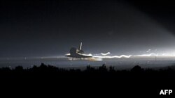 Space shuttle Atlantis lands early Thursday morning at NASA's Kennedy Space Center after its final flight.
