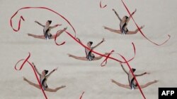 Israel's team compete in the group all-around final event of the Rhythmic Gymnastics at the Olympic Arena during the Rio 2016 Olympic Games in Rio de Janeiro on August 21, 2016. 