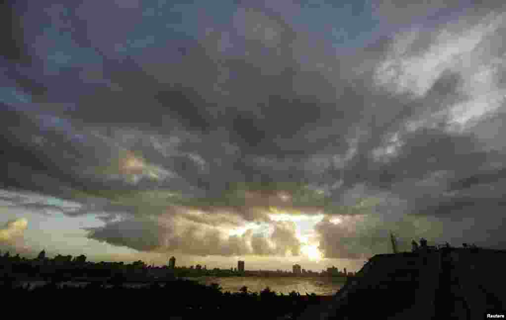 Storm clouds fill the sky over Havana, Cuba, October 24, 2012.