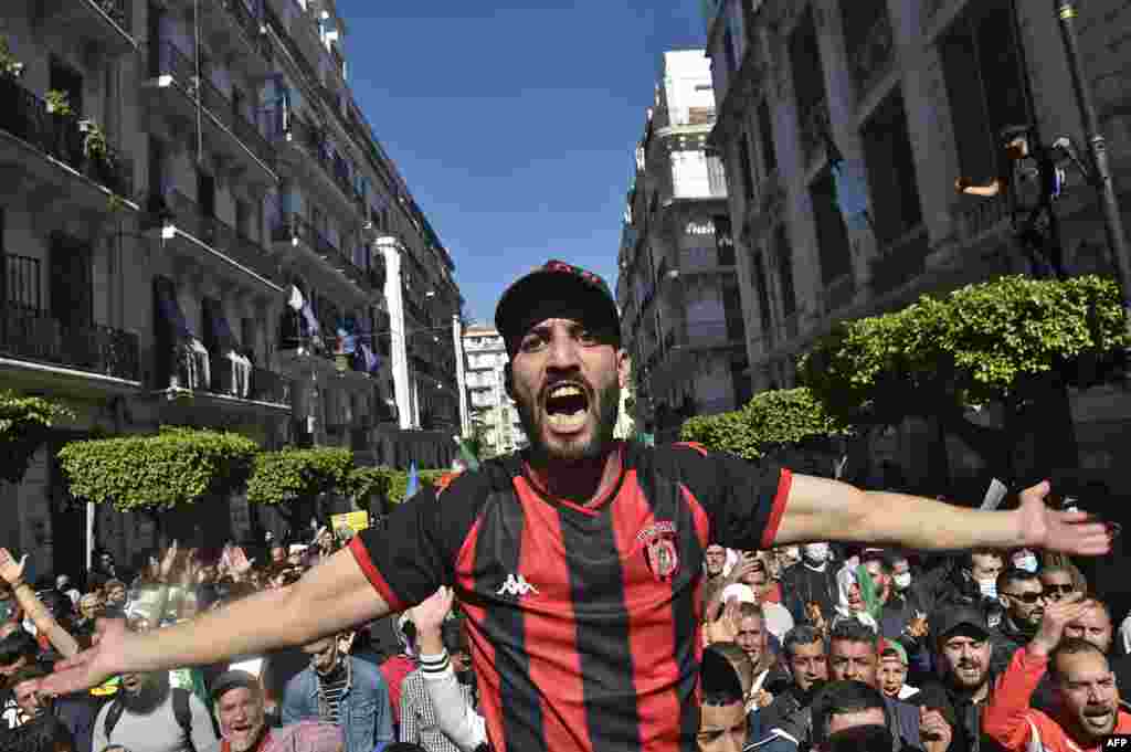 An Algerian anti-government demonstrator shouts slogans during a protest in the capital Algiers.