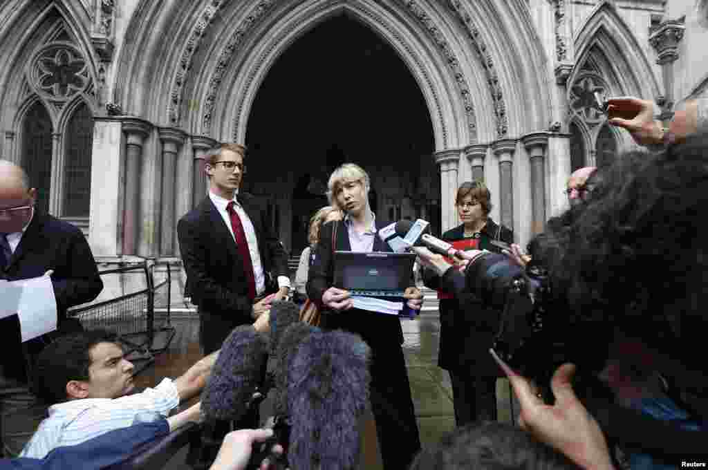 Gwendolen Morgan, the lawyer for David Miranda, makes a statement to members of the media outside the High Court in London. The British authorities can sift through documents seized from the partner of a reporter, who wrote about the leaks by Edward Snowden, to protect national security and investigate any possible links to terrorism, a court ruled.
