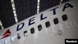 A Delta Airlines aeroplane is seen inside of a hangar in Mexico City, Mexico, May 3, 2017. 