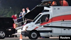A person believed to be Otto Warmbier is transferred from a medical transport airplane to an awaiting ambulance at Lunken Airport in Cincinnati, Ohio, U.S., June 13, 2017. 