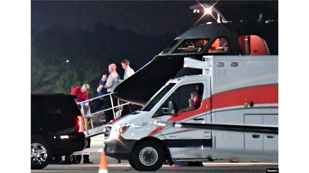A person believed to be Otto Warmbier is transferred from a medical transport airplane to an awaiting ambulance at Lunken Airport in Cincinnati, Ohio, June 13, 2017.