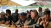 Orang-orang berkumpul di One-Eyed Jack's Saloon selama Sturgis Motorcycle Rally ke-80 di Sturgis, 7 Agustus 2020. (Foto: AP)