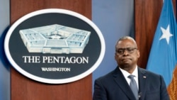 FILE - U.S. Secretary of Defense Lloyd Austin pauses while speaking during a media briefing at the Pentagon, in Arlington, Virginia, Nov. 17, 2021.