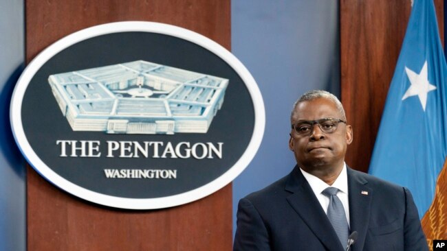 FILE - U.S. Secretary of Defense Lloyd Austin pauses while speaking during a media briefing at the Pentagon, in Arlington, Virginia, Nov. 17, 2021.