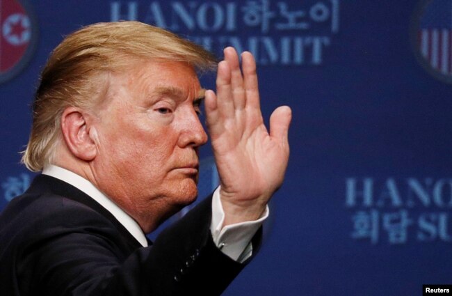 U.S. President Donald Trump reacts during a news conference after his summit with North Korean leader Kim Jong Un, at the JW Marriott Hotel in Hanoi, Feb. 28, 2019.