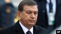 FILE - Uzbek President Shavkat Mirziyoyev is pictured in Moscow, April 5, 2017. The abolition of Uzbekistan's exit visa system is one of a number of changes being brought in since Mirziyoyev came to power last year.