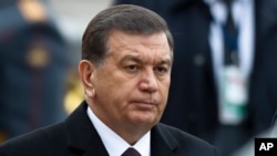 FILE - Uzbek President Shavkat Mirziyoyev is pictured in Moscow, April 5, 2017. The abolition of Uzbekistan's exit visa system is one of a number of changes being brought in since Mirziyoyev came to power last year.
