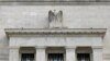 FILE - The Federal Reserve building is pictured in Washington, Aug. 22, 2018.