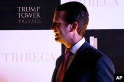 President Donald Trump's eldest son, Donald Trump Jr. leaves after a photo shoot in Kolkata, India, Feb. 21, 2018.
