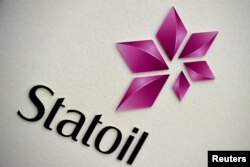 FILE - The company logo of Statoil is seen during a company results presentation in London, Britain, Feb. 6, 2015.