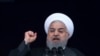 Iranian President Hassan Rouhani speaks during a ceremony celebrating the 40th anniversary of the Islamic Revolution, at the Azadi, Freedom, Square in Tehran, Feb. 11, 2019.