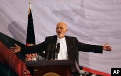 Afghan president-elect Ashraf Ghani Ahmadzai speaks in his first public appearance since winning the election runoff in Kabul, Sept. 22, 2014.