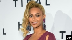 FILE - Beyonce arrives at TIDAL X: 1020 Amplified by HTC at the Barclays Center in New York. 