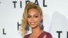 FILE -Beyonce arrives at TIDAL X: 1020 Amplified by HTC at the Barclays Center in New York. Beyonce released "Formation" on Saturday, Feb. 6, 2016 as a download on the streaming service, Tidal, which she co-owns with husband Jay Z, Rihanna and other artists. Taken Oct. 20, 2015.