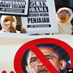 Indonesian women protest US President Barack Obama's upcoming visit, in Banda Aceh, Aceh province, 14 Mar 2010.