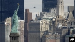 For over a century, the Statue of Liberty has welcomed immigrants arriving in New York City.[AP]