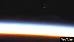 A video screen grab of International Space Station's video feed