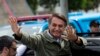 Jair Bolsonaro, presidential candidate with the Social Liberal Party, waves after voting in the presidential runoff election in Rio de Janeiro, Brazil, Sunday, Oct. 28, 2018. Bolsonaro is running against leftist candidate Fernando Haddad of the Workers’ P