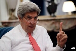 U.S Secretary of State John Kerry speaks with the media after attending the Mideast peace conference, Jan. 15, 2017 in Paris.