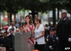 People read the names of the victims during a commemoration ceremony for the victims of the September 11 terrorist attacks at the National September 11 Memorial and Museum in New York City, Sept. 11. 2016.