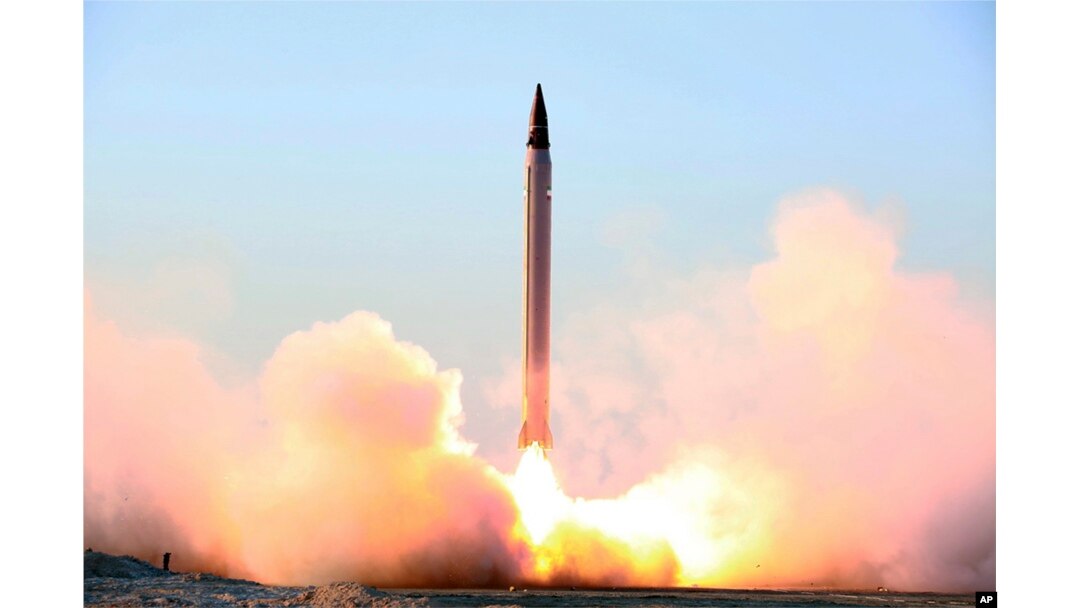 This picture released by the official website of the Iranian Defense Ministry on Sunday, Oct. 11, 2015, claims to show the launching of an Emad long-range ballistic surface-to-surface missile in an undisclosed location. Iran successfully test fired a new