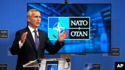 NATO Secretary General Jens Stoltenberg speaks during a media conference after a meeting of national security advisers at NATO headquarters in Brussels, Oct. 7, 2021. 