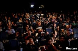 Spectators cheer as they watch competitors play "Call of Duty: Infinite Warfare" at the Cineplex WorldGaming Canadian Championship Series in Toronto, Ontario, March 26, 2017.