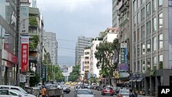 In Taipei, enforced building codes reduce quake destruction