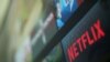 FILE - The Netflix logo is pictured on a television in this illustration photograph taken in Encinitas, Calif., Jan. 18, 2017. 