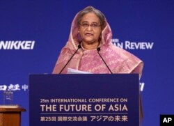 FILE - Bangladesh's Prime Minister Sheikh Hasina delivers a speech at a session of the International Conference on "The Future of Asia" on May 30, 2019, in Tokyo, Japan.