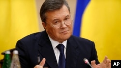 Ukraine's fugitive president Viktor Yanukovych speaks at a news conference in Rostov-on-Don, a city in southern Russia, Feb. 28, 2014.