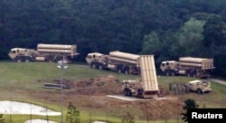 FILE - Terminal High Altitude Area Defense (THAAD) interceptors are seen as they arrive at Seongju, South Korea, Sept. 7, 2017.