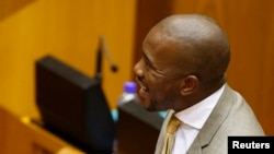 FILE - Mmusi Maimane, head of the South African opposition Democratic Alliance, says criticism of President Jacob Zuma and his ruling ANC party informs the public. 