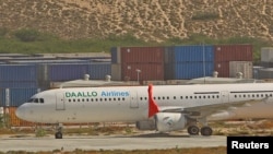 An aircraft belonging to Daallo Airlines is parked at the Aden Abdulle international airport after making an emergency landing following an explosion inside the plane in Somalia's capital Mogadishu, Feb. 3, 2016. 