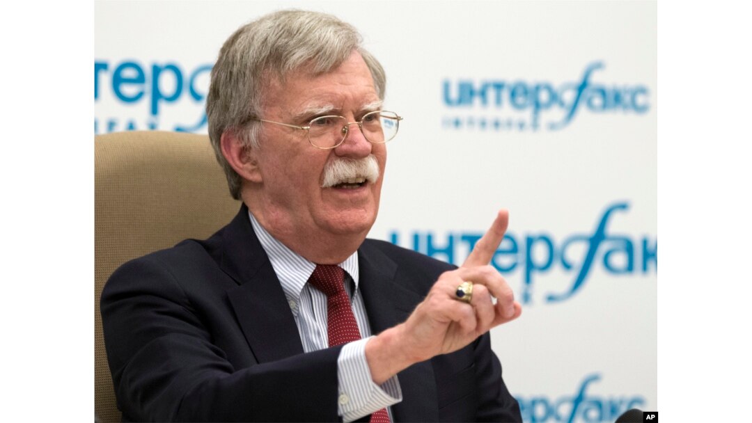 U.S. National security adviser John Bolton gestures while speaking to the media after his talks with Russian President Vladimir Putin in Moscow, Russia, June 27, 2018.