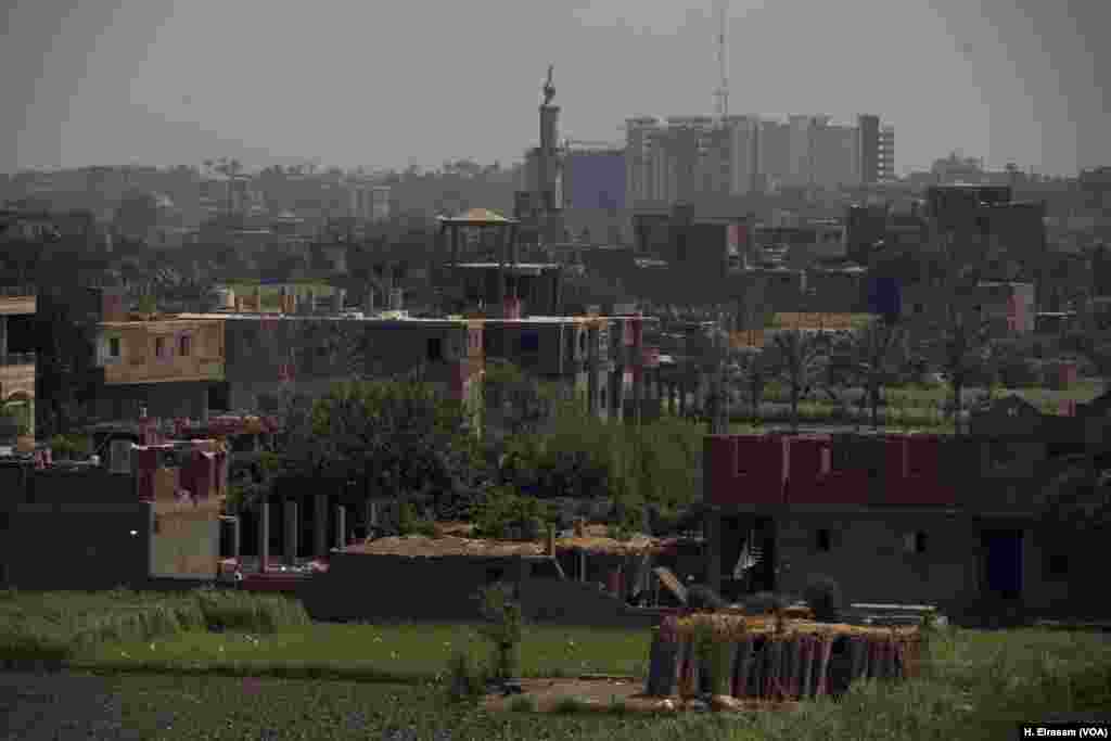 Dahab Island on the Nile is one of many informal neighborhoods in Cairo where the shortage of homes has prompted many to build without permits and caused many to build on what were fertile, highly productive farmlands along the Nile.