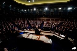 FILE - President Donald Trump delivers his State of the Union address to a joint session of U.S. Congress on Capitol Hill in Washington, Tuesday, Jan. 30, 2018. (Jim Bourg/Pool via AP)