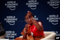 FILE - executive director of the charity Oxfam Winnie Byanyima speaks during the World Economic Forum on Africa in Abuja, Nigeria.