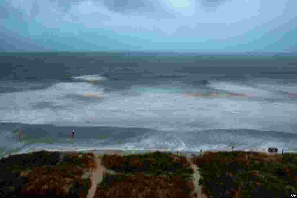 Ocean water is moved around by the wind as Hurricane Isaias nears North Myrtle Beach, South Carolina, Aug. 3, 2020.